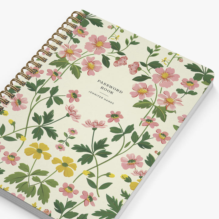 Floral patterned password book with pink and yellow flowers on a white background