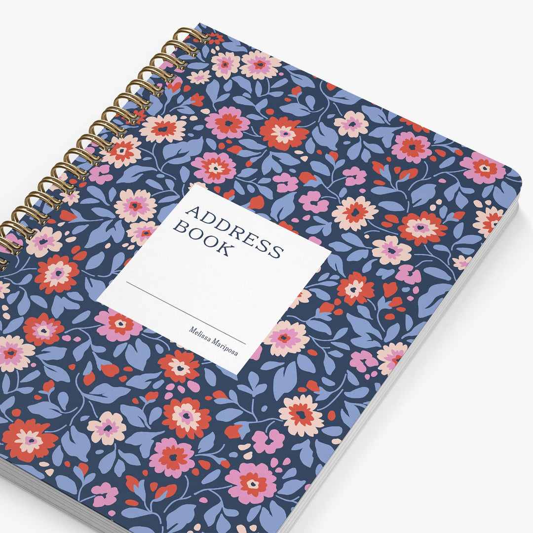 Address book with floral design on a white background