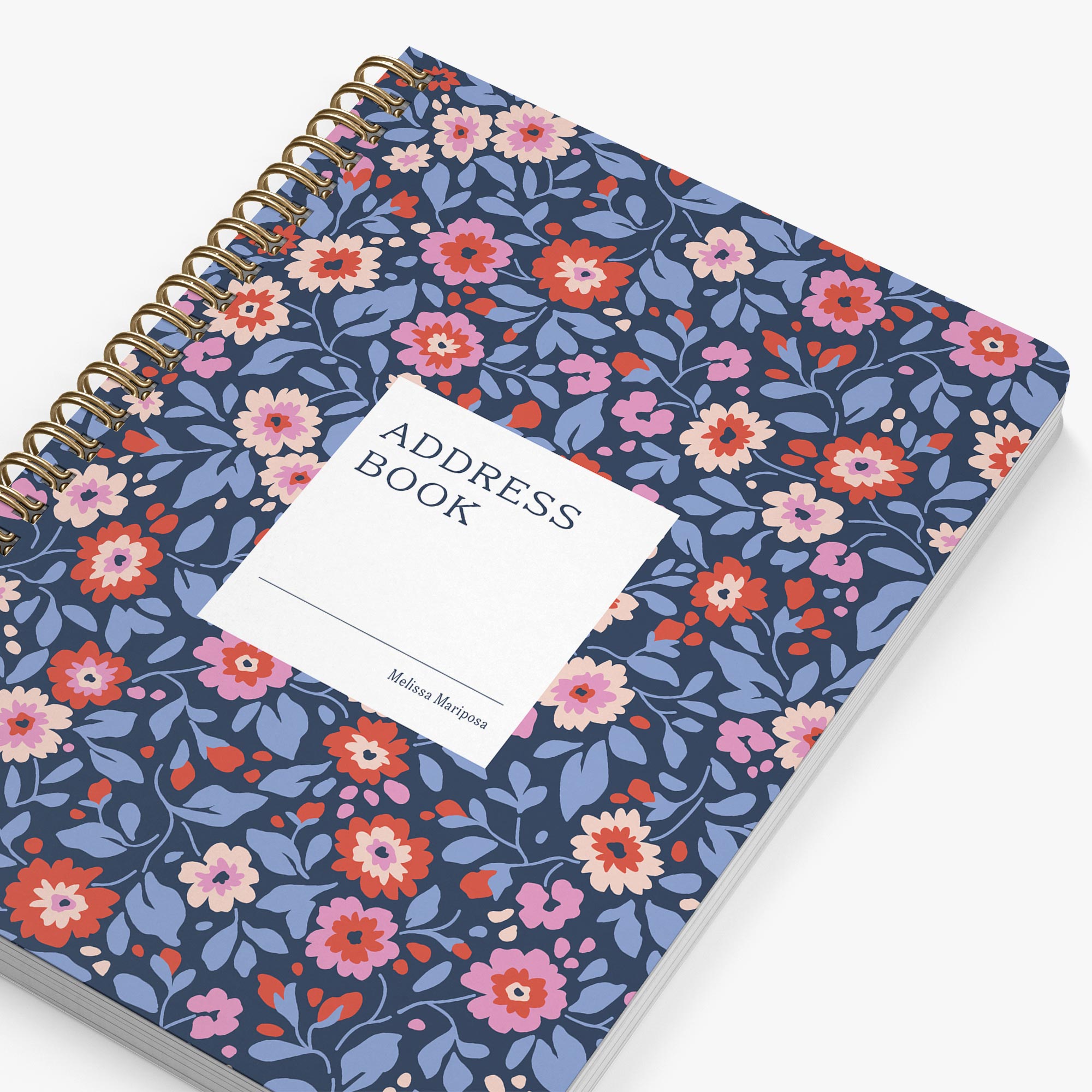 Address book with floral design on a white background