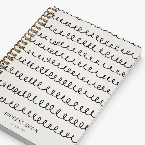 Address book with handwritten-style text on a white background
