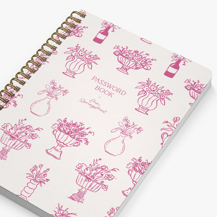 Password book with pink floral illustrations on a white background