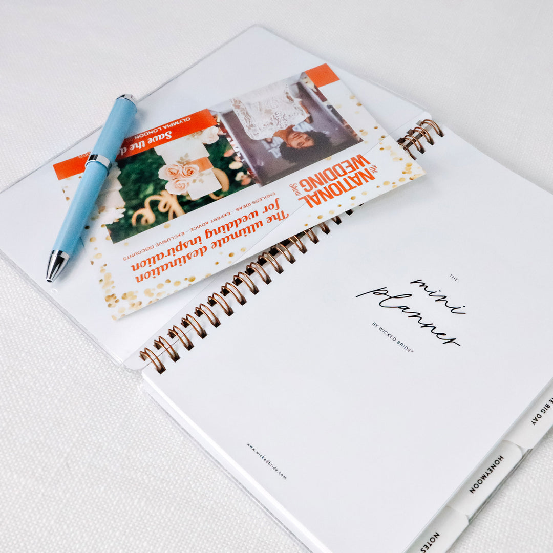 Wedding planner interior cover view with convenient built-in pockets for storing notes, business cards, and planning essentials