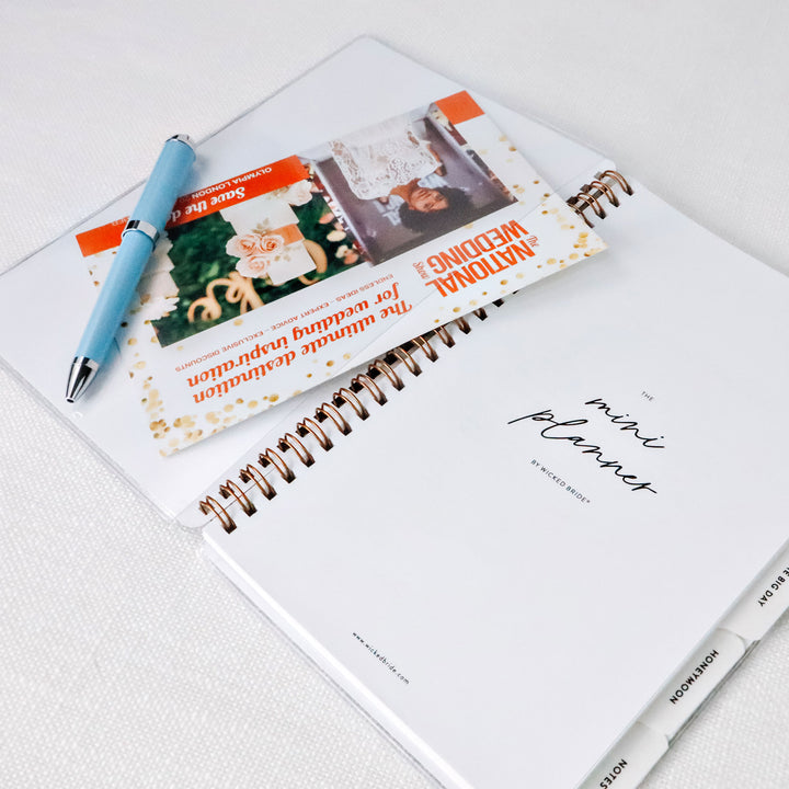 Wedding planner interior cover view with convenient built-in pockets for storing notes, business cards, and planning essentials