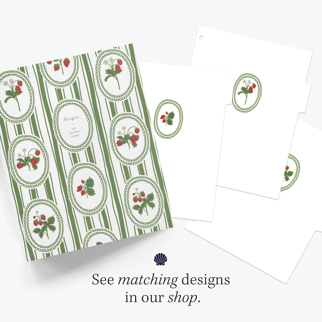 Recipe binder with a red and green strawberry pattern along with matching index tab dividers on a white background
