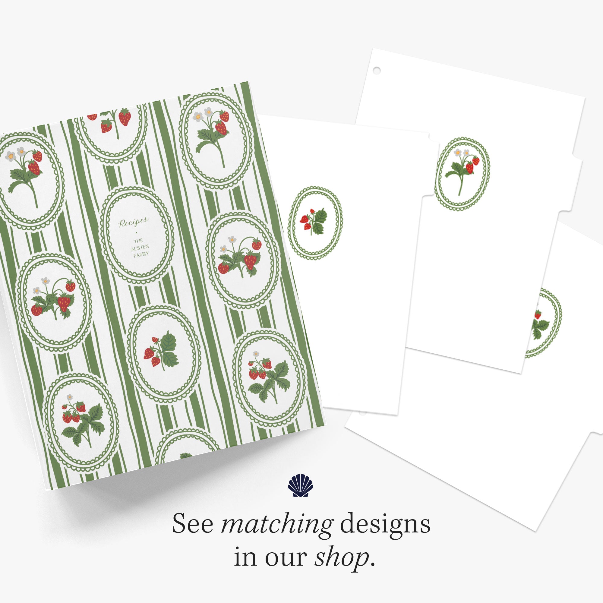 Recipe binder with a red and green strawberry pattern along with matching index tab dividers on a white background