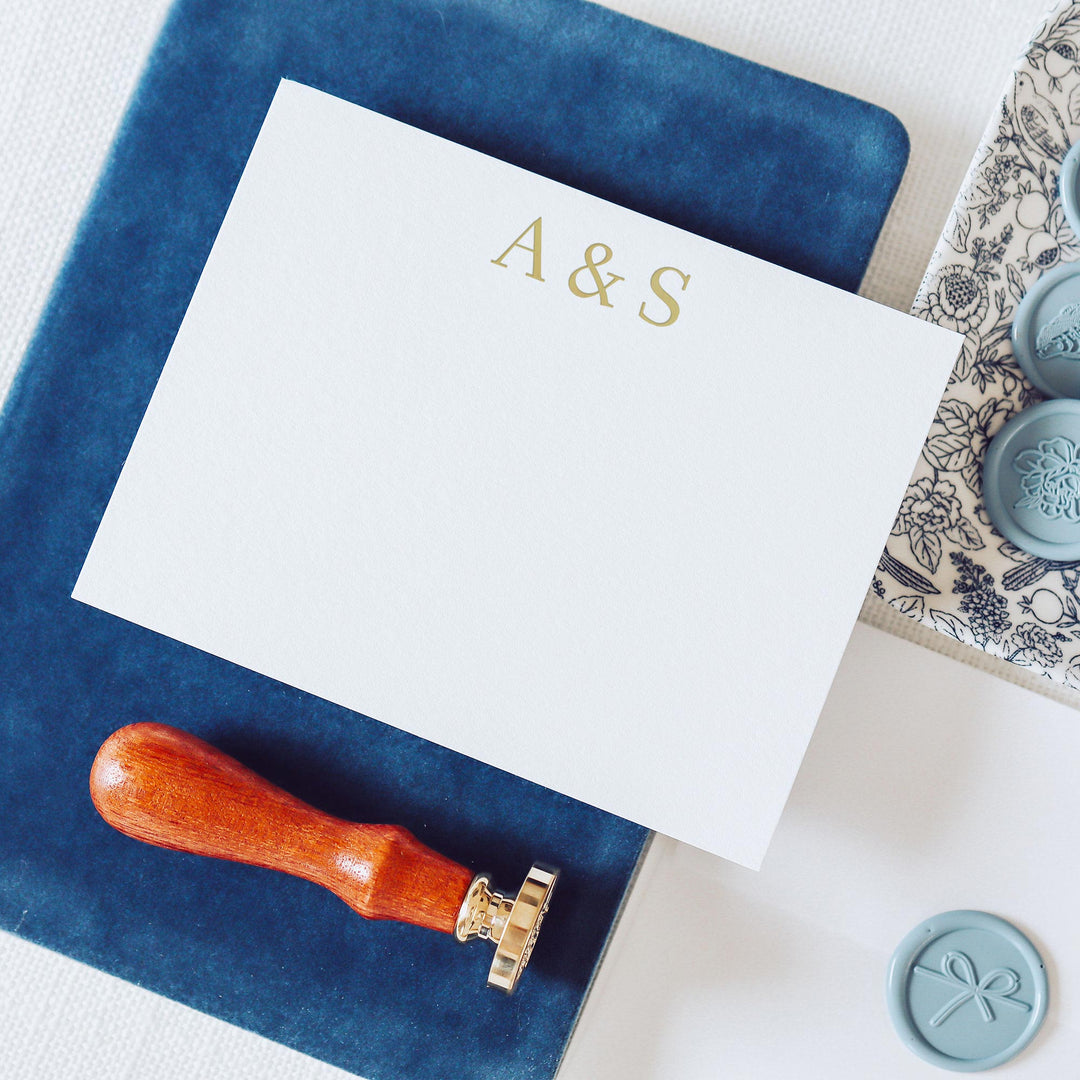 Personalized gold foil note card printed on white cotton paper styled with wax seals