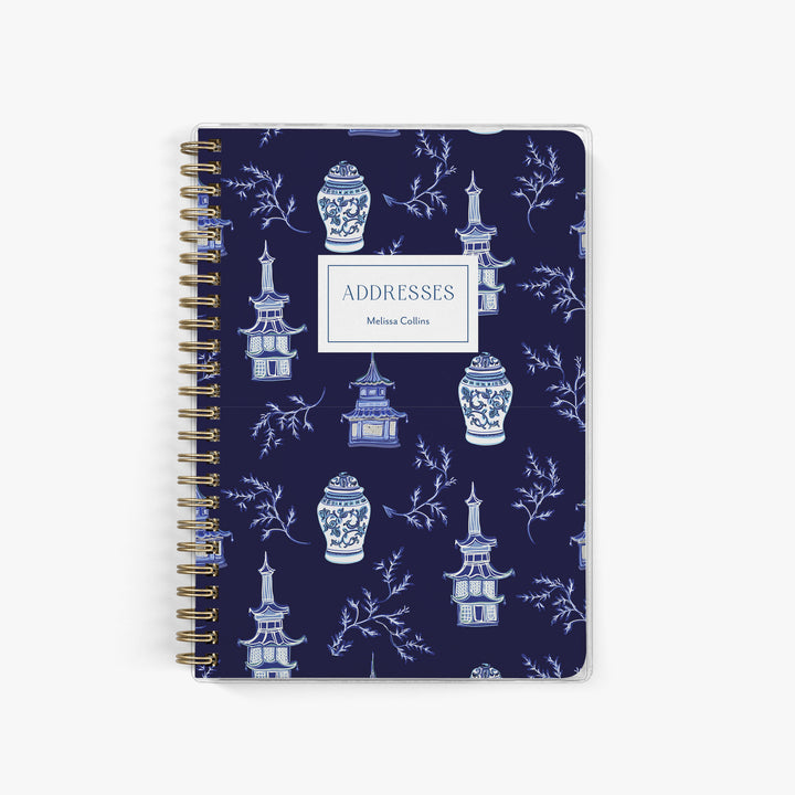 This adorable custom address book features a hand drawn pattern of blue and white ginger jars and pagodas