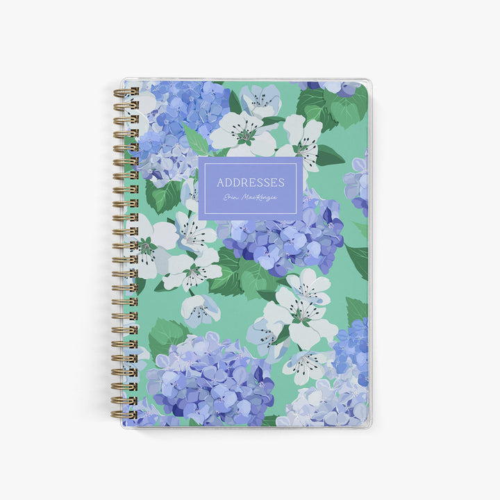 This custom address book features a bright hydrangea pattern in green, white and French blue