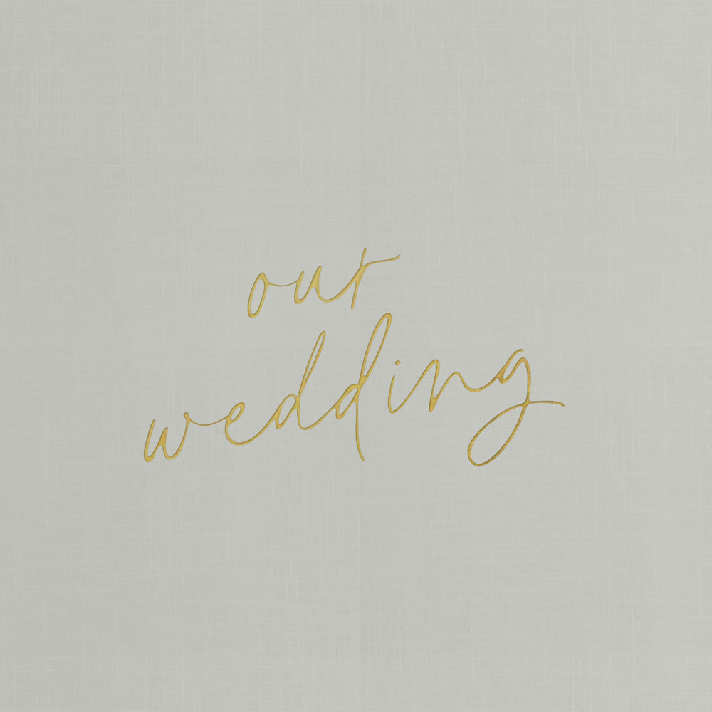 Our wedding binders are the perfect wedding planning tool, shown in a "our wedding" script design with the couple's first names