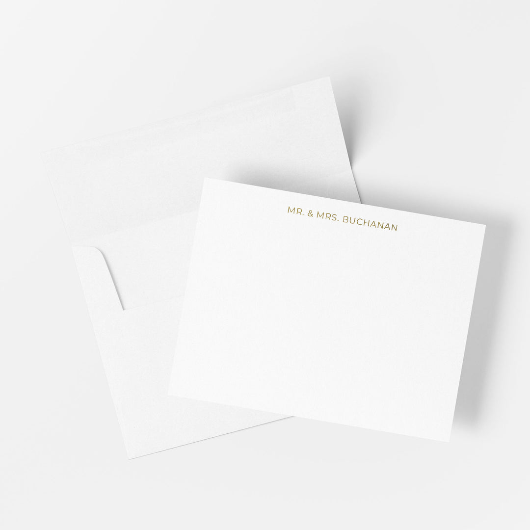 Personalized gold foil note card printed by hand on cotton paper with matching envelope on a white background