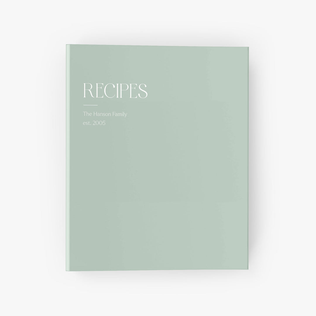 Personalized recipe binder with a minimalist, modern editorial design that reads 'RECIPES' at the top with your family name below.