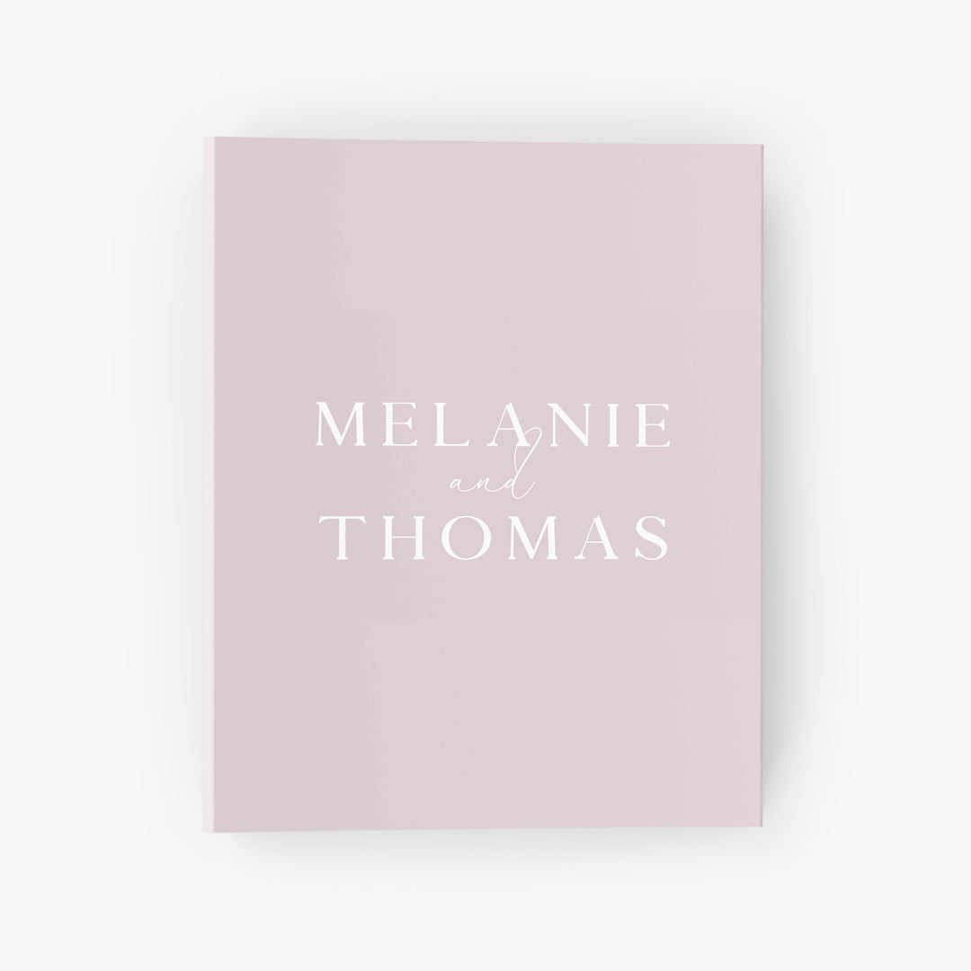 Personalized wedding planning binder features your first names in an elegant font on the cover in your choice of colors