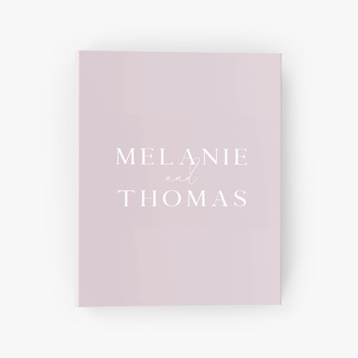 Personalized wedding planning binder features your first names in an elegant font on the cover in your choice of colors