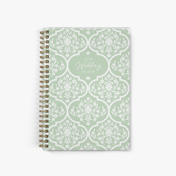 Personalized elopement planner featuring a beautiful floral trellis design in green and white, perfect for micro weddings