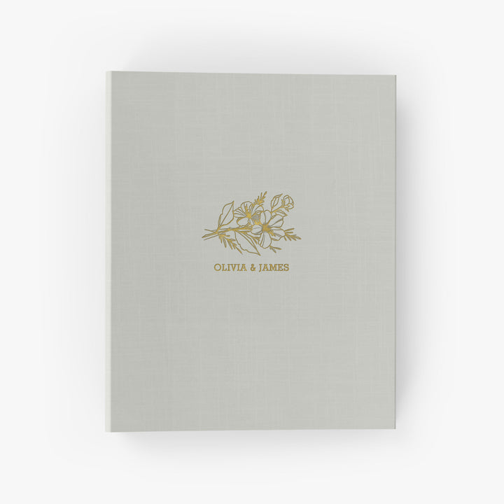 Our wedding binders are the perfect wedding planning tool, shown in a floral sprig design with the couple's first names