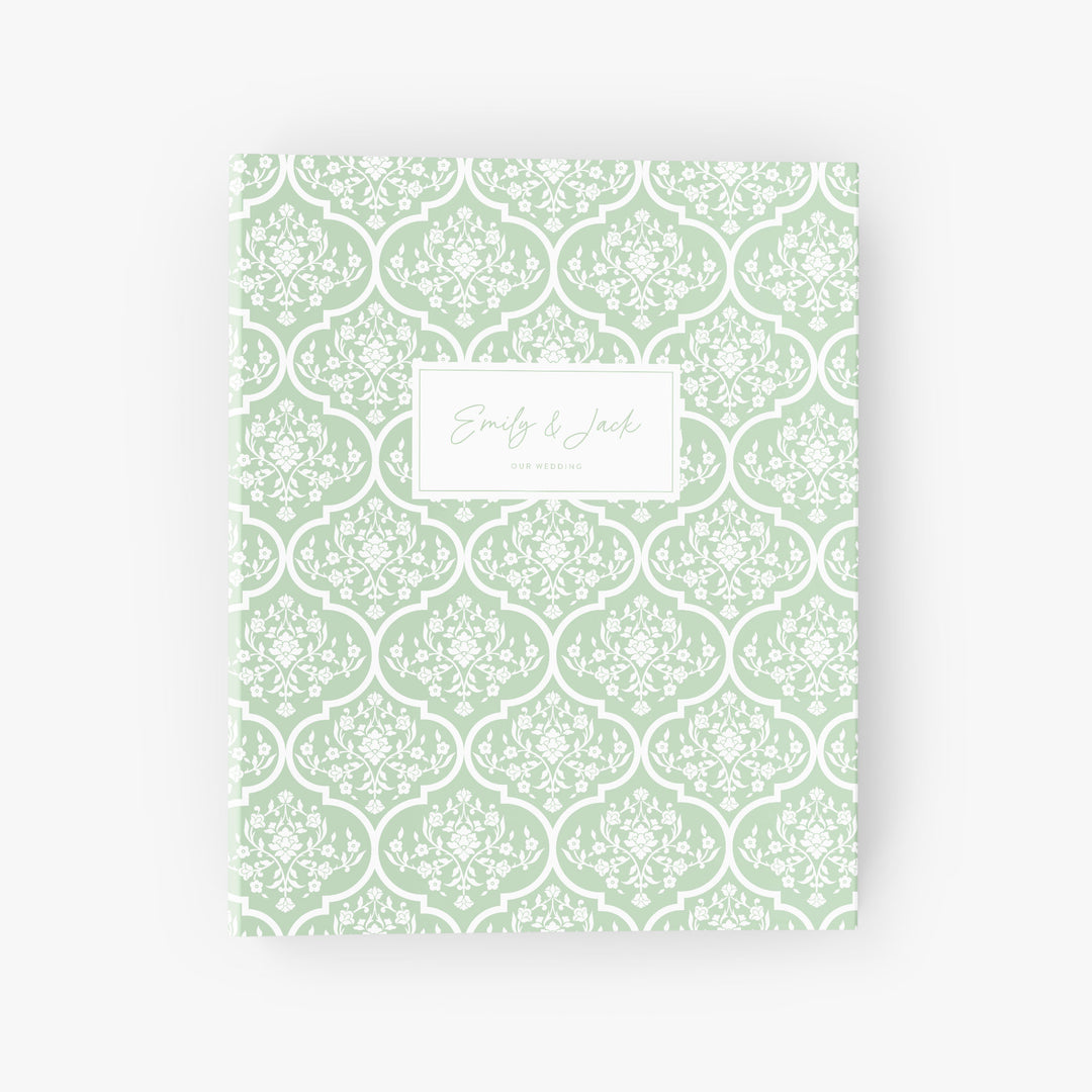 Custom wedding planning binder with a beautiful green and white trellis design