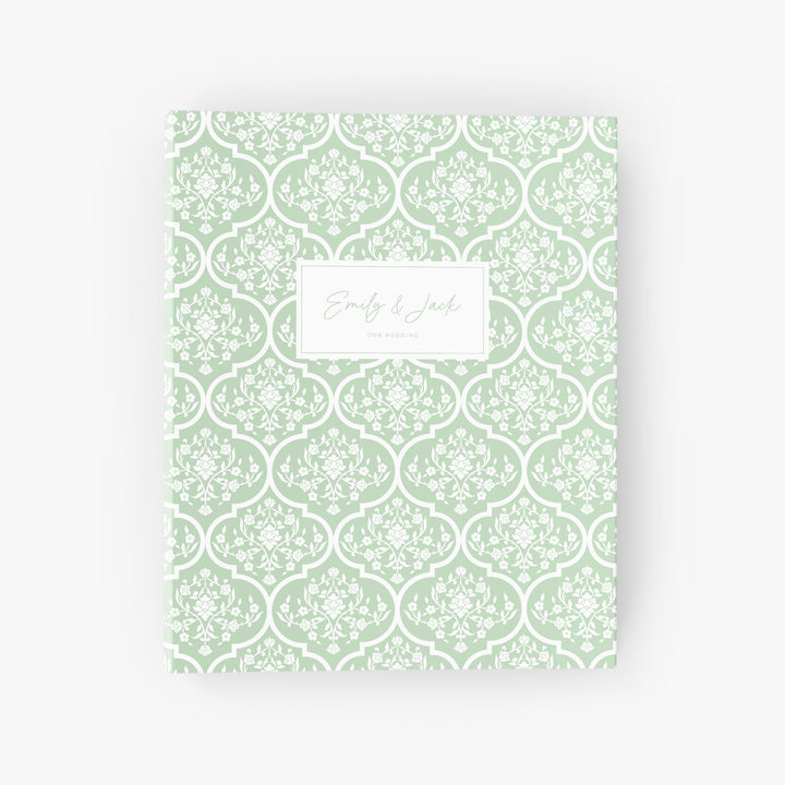 Custom wedding planning binder with a beautiful green and white trellis design
