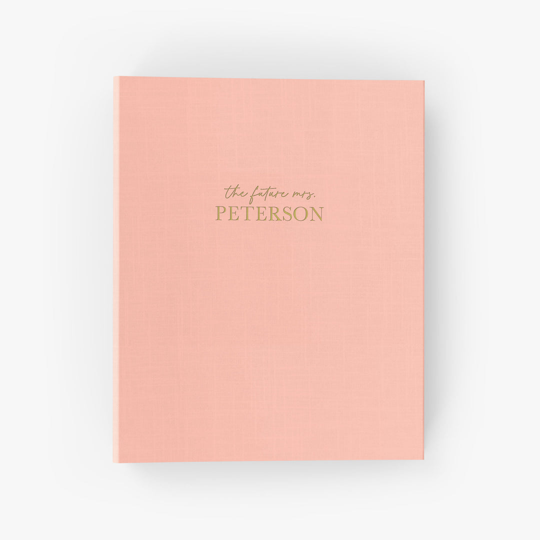 Our wedding binders are the perfect wedding planning tool, shown with the future last name of the bride