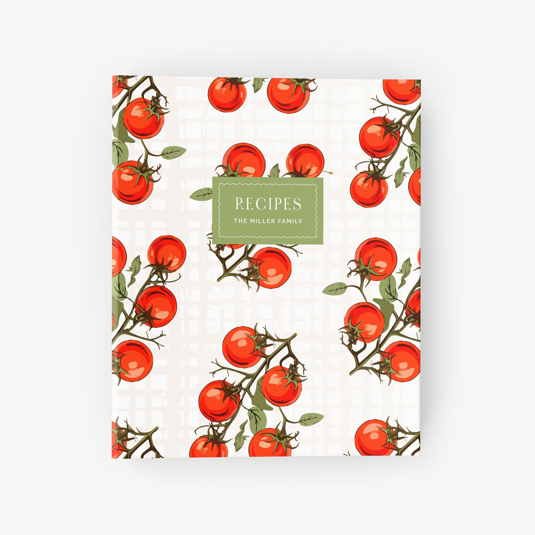 Custom recipe binder with a vintage-inspired tablecloth design of plump red tomatoes on green vines