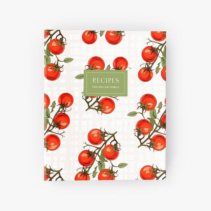 Custom recipe binder with a vintage-inspired tablecloth design of plump red tomatoes on green vines