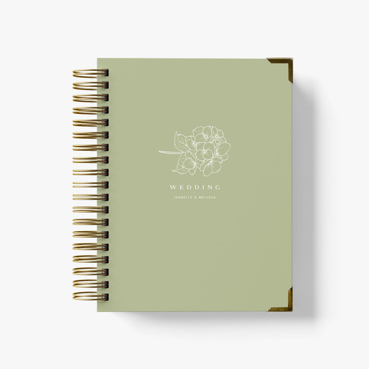 Our LGBT wedding planner books are all-inclusive and gender-neutral, shown in a hydrangea sprig design