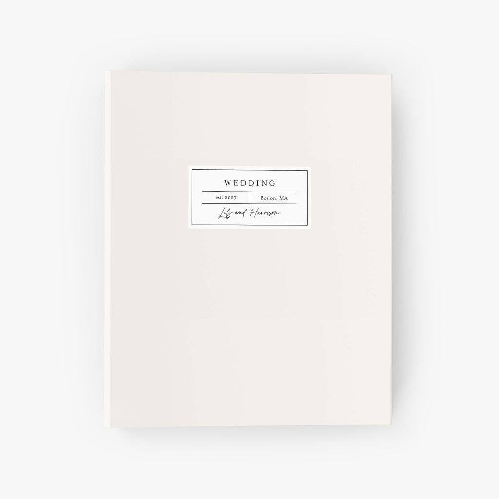 Personalized wedding binder with a modern apothecary label design includes your names, wedding year and location