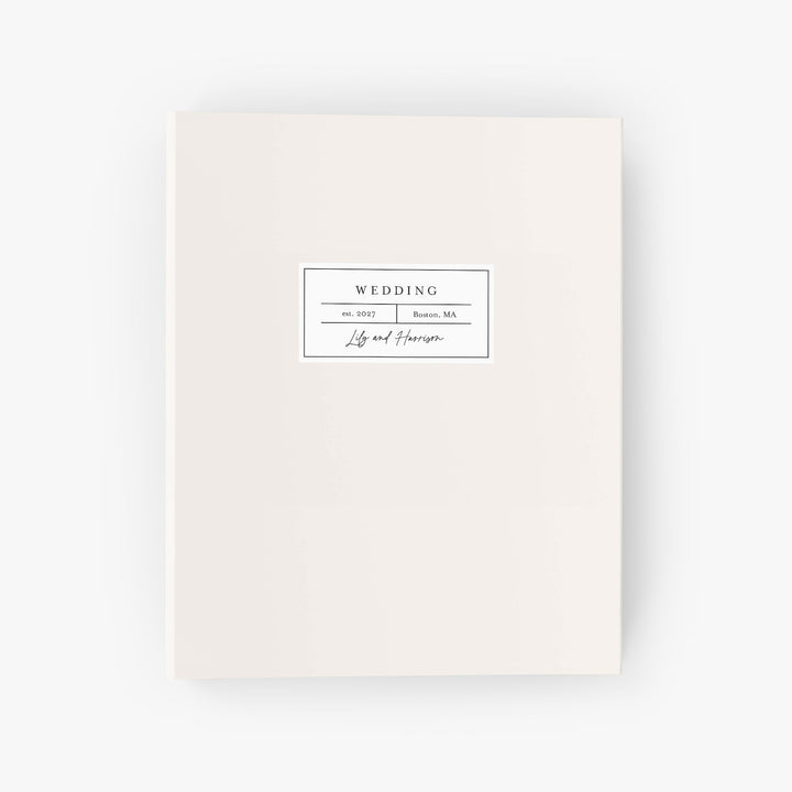Personalized wedding binder with a modern apothecary label design includes your names, wedding year and location