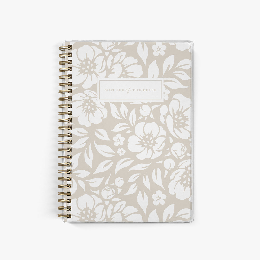 Shown in a neutral floral print, Mother of the Bride planners are exclusive to Keepsake Paper Co.