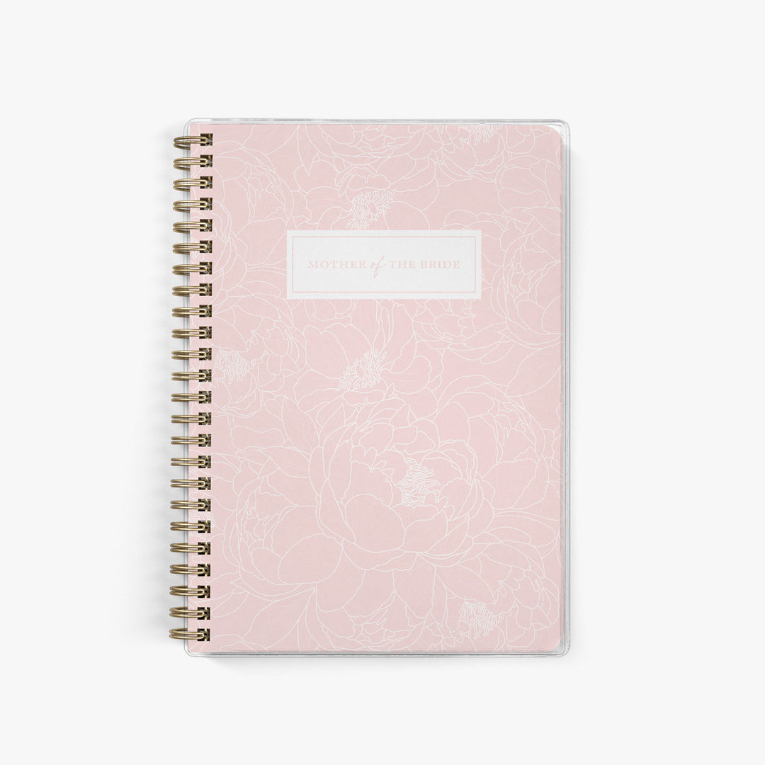 Shown in a blush peony print, Mother of the Bride planners are exclusive to Keepsake Paper Co.