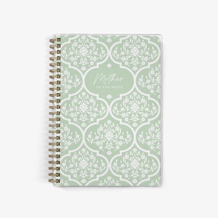 Mother of the Bride planner shown with a classic green and white floral trellis pattern