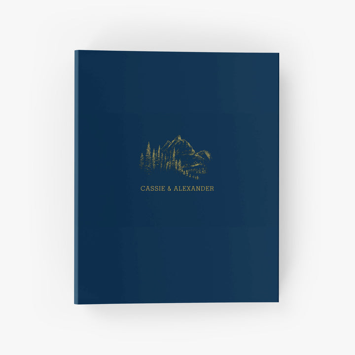 Our wedding binders are the perfect wedding planning tool, shown in a mountain range design with the couple's first names