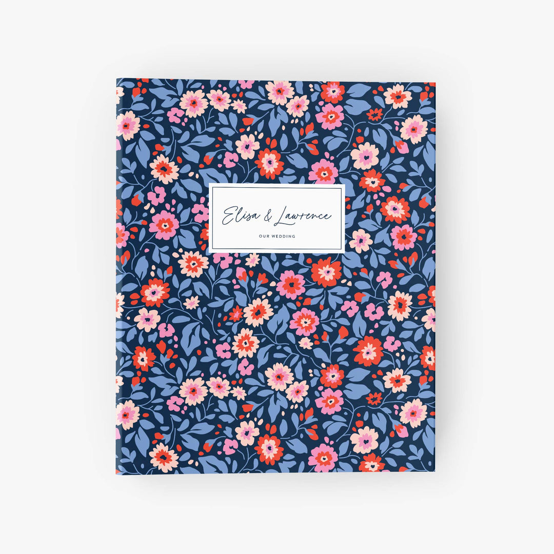 Personalized wedding planning binder featuring a preppy navy, red and pink floral design customized with the couple's names