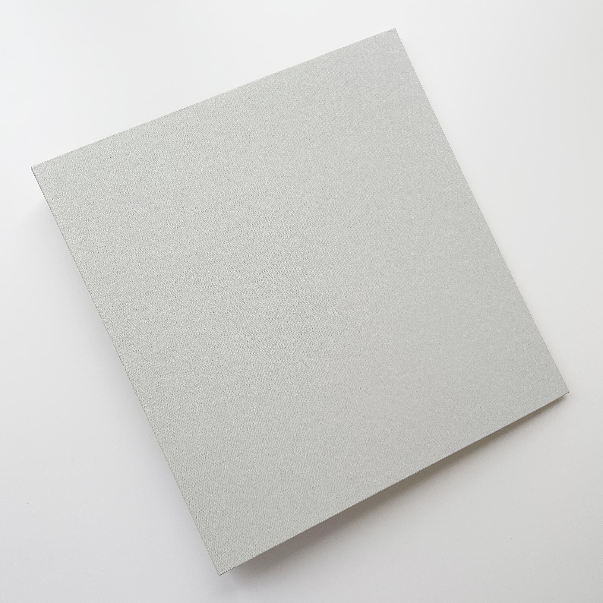Beige linen binder on a white background
